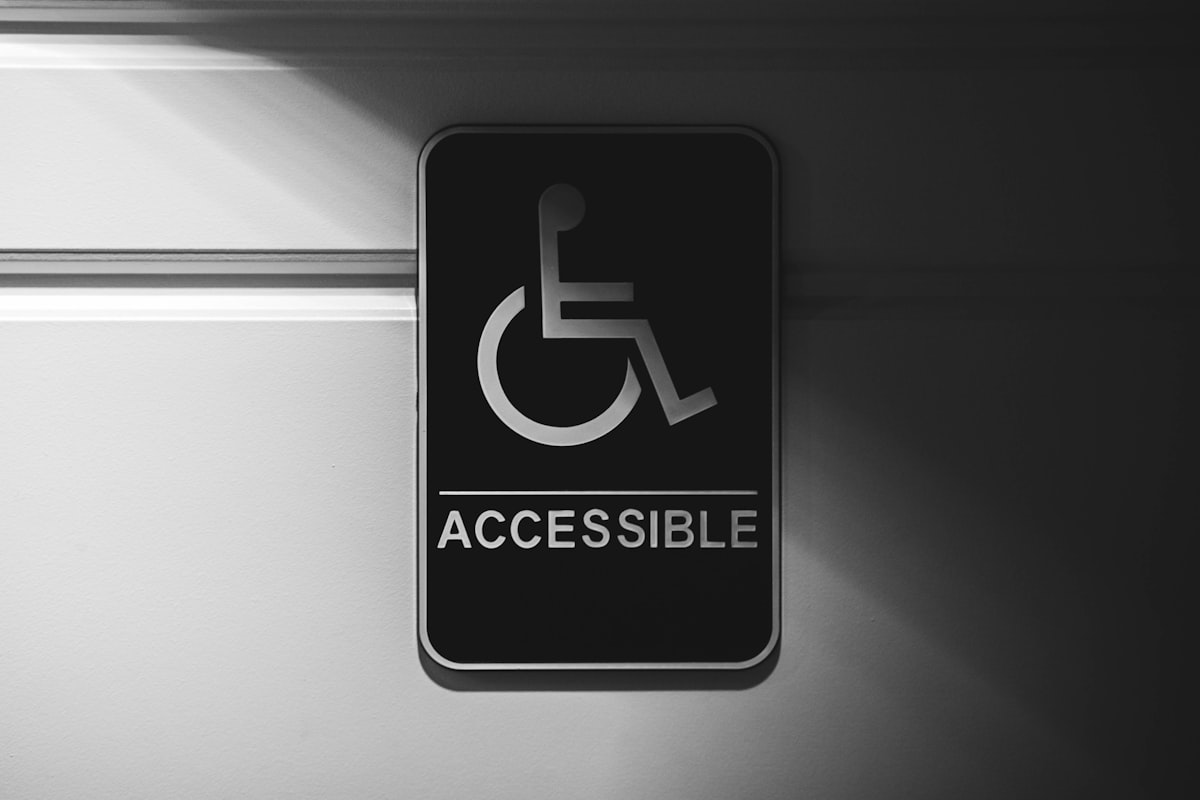 Wheelchair accessible signage representing dealer website accessibility and ADA compliance